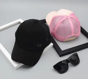 Summer breathable mesh baseball caps for women with stylish metal letter M design.