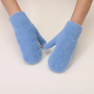 Cozy winter warm plush knit mittens detail, soft fluffy rabbit fur texture for cold weather.