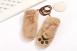 Detailed shot of cute winter plush mittens with paw print design and cozy fleece lining.