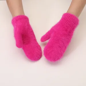 Pink fluffy winter warm mittens, plush rabbit fur knit gloves for women cold weather wear.