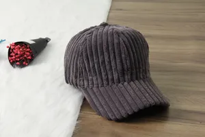 Corduroy baseball cap detail view, soft warm casual hat, comfortable daily wear accessory.