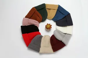 Solid color ribbed knit beanie hat for women and men, winter warm cuffed thermal cap.