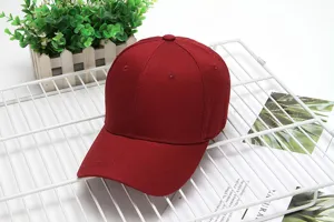 Burgundy cotton baseball cap detail view, classic 6-panel plain casual sun hat for outdoor wear.