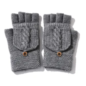 Grey half-finger convertible knit gloves with cable pattern and button detail for winter.