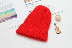 Winter warm knitted beanie hat for women and men, solid red cozy pullover cuff cap.
