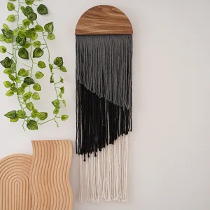 Bohemian handmade macrame wall hanging featuring wooden top and gradient tassel tapestry decor.