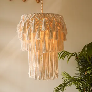 Detailed view of bohemian handmade woven cotton rope lampshade with chic multi-layered tassel.