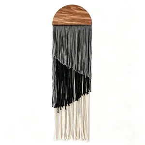 Detailed view of the modern minimalist wooden top multi-layer tassel wall hanging decor.