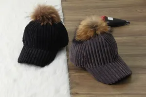 Women corduroy baseball cap with fluffy pom pom, warm winter thick casual sports hat.