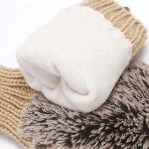 Women winter knitted fleece lined warm mittens with cute hedgehog plush detail closeup view.
