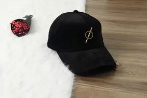 Black velvet baseball cap with metal ring and bar decor, stylish autumn winter headwear.