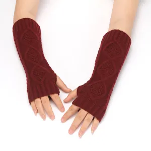 Knit arm warmers detail view, classic diamond cable knit texture, winter fingerless sleeves.