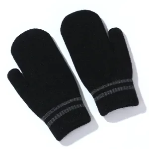 Detailed view of women winter knit mittens with cute stripes, warm and thick for cold weather.