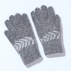 Grey fluffy knitted winter gloves for women, warm five-finger thermal fuzzy gloves detail.