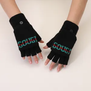 Black knit convertible fingerless gloves with warm flip-top design and stripe pattern.