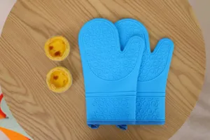 Silicone oven mitts detail shot, heat resistant baking gloves for kitchen cooking, blue.