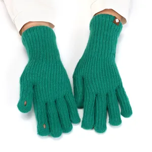 Close-up of green knitted touchscreen fingerless gloves, showing fine ribbed texture details.