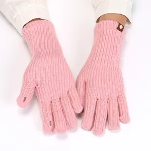 Pink knit fingerless gloves detail view, soft winter thermal ribbed warm gloves.
