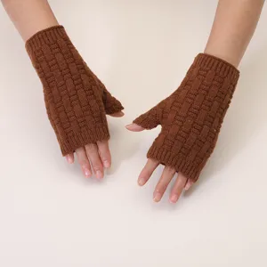 Brown winter knit fingerless gloves detail view, warm wool material with nice texture.