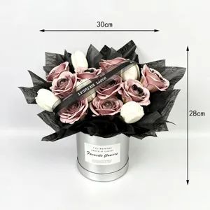 Elegant rose and tulip bouquet in a stylish box, perfect romantic gift for girlfriend.