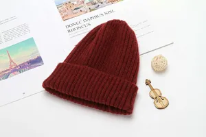 Thick ribbed knit winter beanie hat in dark red, cozy warm winter headwear for daily wear.