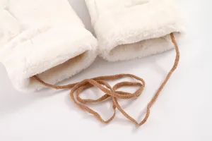 Cute winter warm plush mittens for women detailed view showcasing soft white fabric and string.
