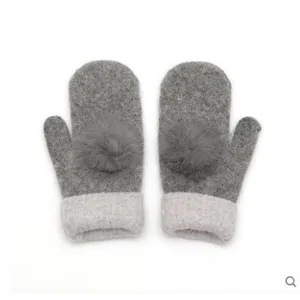Women's winter wool knit mittens with cute rabbit fur balls, double layered thick grey warm gloves.