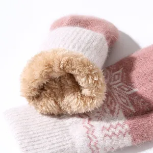Plush winter mittens with thick fleece lining and cozy knit pattern for women warmth.