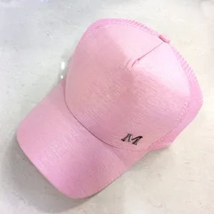 Pink mesh baseball cap for women, summer breathable hat with metal M letter decor.