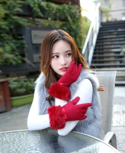 Women winter warm touchscreen gloves with fluffy faux fur cuffs and cute bows for cold weather.