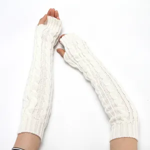 Detailed view of white knit long fingerless gloves, cozy winter arm warmers for daily wear.