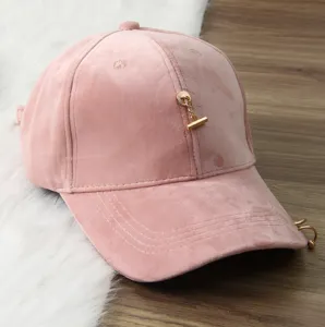 Pink velvet baseball cap with metal charm, stylish curved brim casual hat for women and men.