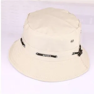 Classic beige cotton bucket hat for outdoor sun protection, casual style for men and women.