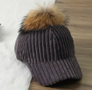 Corduroy baseball cap for women with large fur pom pom winter warm hat main view