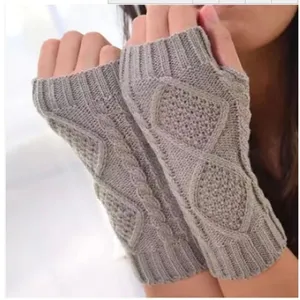 Grey knitted fingerless gloves for women and men, winter warm cable knit hand warmers.
