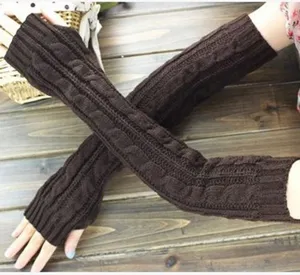 Long knit fingerless gloves detail view, cozy brown cable knit arm warmers for winter.