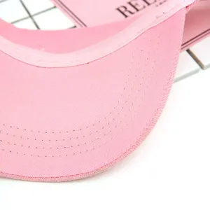 Pink cotton empty top hat sun visor detail, summer outdoor UV protection baseball cap.