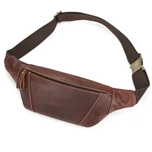 Detailed closeup of retro genuine leather waist bag, dark brown cowhide with durable strap.