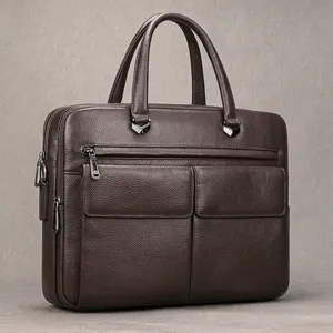 Elegante bolso de negocios de cuero genuino para hombre marron maletin vista detallada.