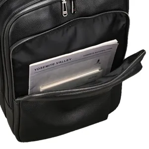 Black genuine cowhide leather backpack for men, stylish business laptop bag for daily use.