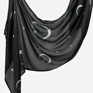 Black rayon long scarf featuring a stylish moon and star print, perfect sun protection shawl.