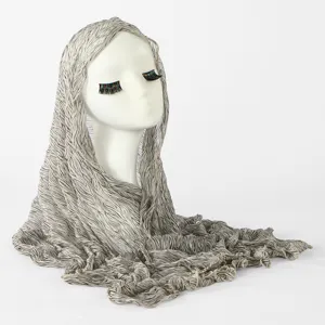Detailed view of lightweight crinkle hijab scarf featuring subtle abstract pattern for versatile styling.
