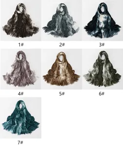 Detailed view of tie-dye cotton linen scarf variants showing unique ink wash texture and fringe.