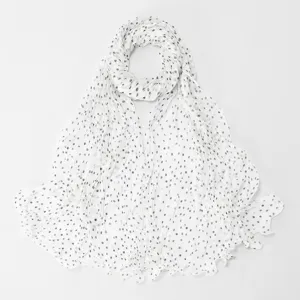 Detail shot of white polka dot cotton linen long scarf, bubble wrinkle texture, versatile shawl.