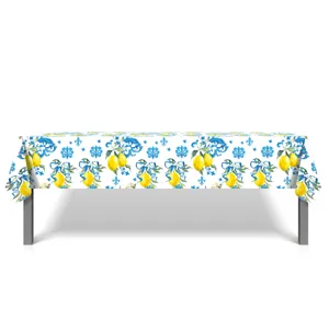 Blue and yellow lemon tablecloth with Mediterranean majolica floral print for dining table.