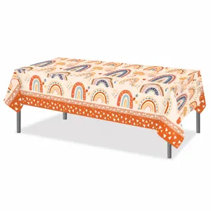 Bohemian rainbow tablecloth detail, perfect for birthday party and festive holiday event table decor.