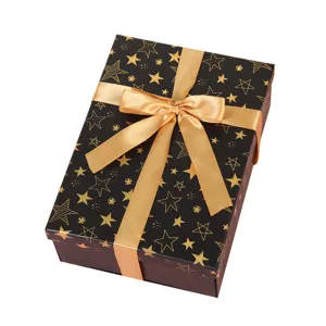 Black gold star gift box with ribbon bow, elegant foldable box for birthday party packaging.