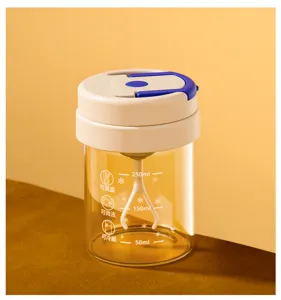 Portable electric glass stirring cup with scale marks, heat resistant for coffee and shakes.