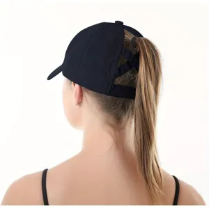 Detail view of black ponytail baseball cap, breathable mesh quick dry fabric design.