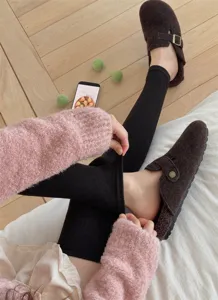 Thickened wool over-the-knee leg warmers for women, winter thermal knitted long socks detail.